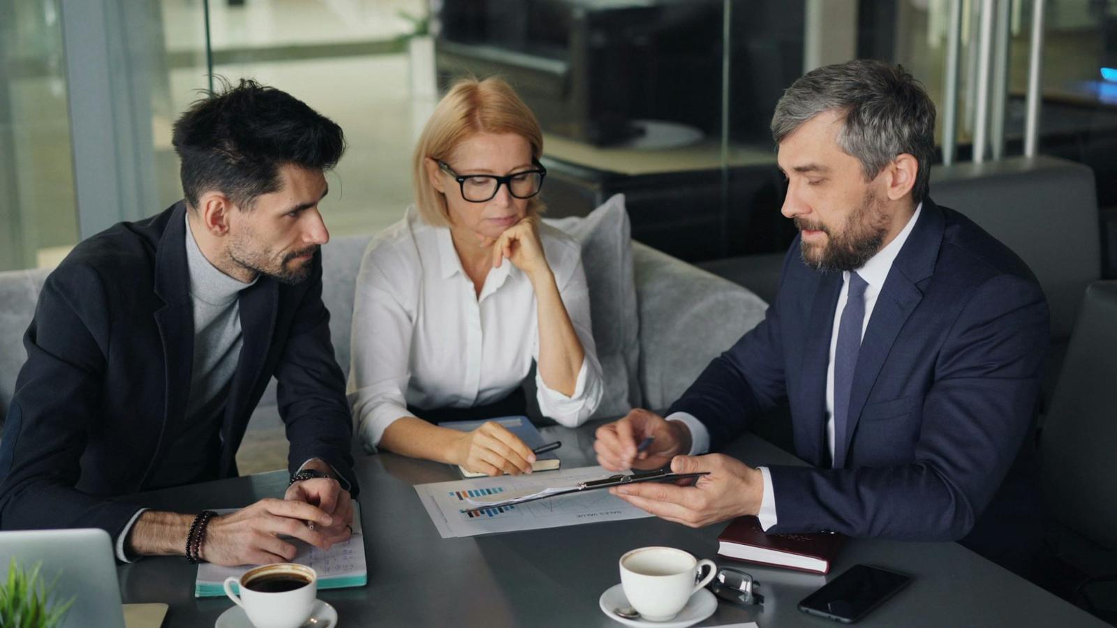 McDonald Legal and SmartTitle team discussing an off-the-plan property transaction